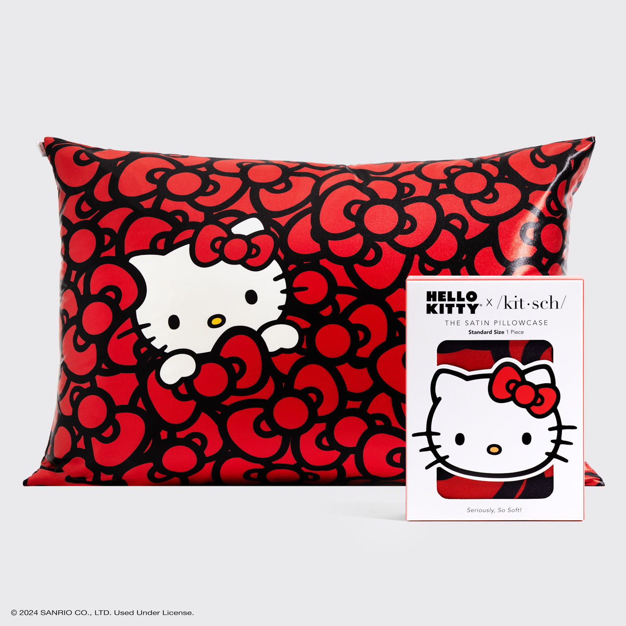 Hello Kitty x Kitsch Satin-Kissenbezug - Hello Kitty badet in einem Meer von Schleifen